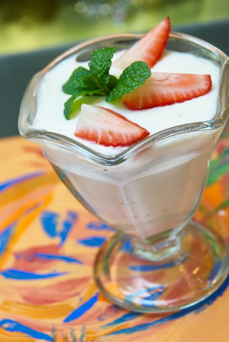 Yogurt with strawberries in a dessert glass